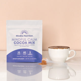 Mindful Nutrition Mindful Calm Cocoa Mix pouch with cup and scoop